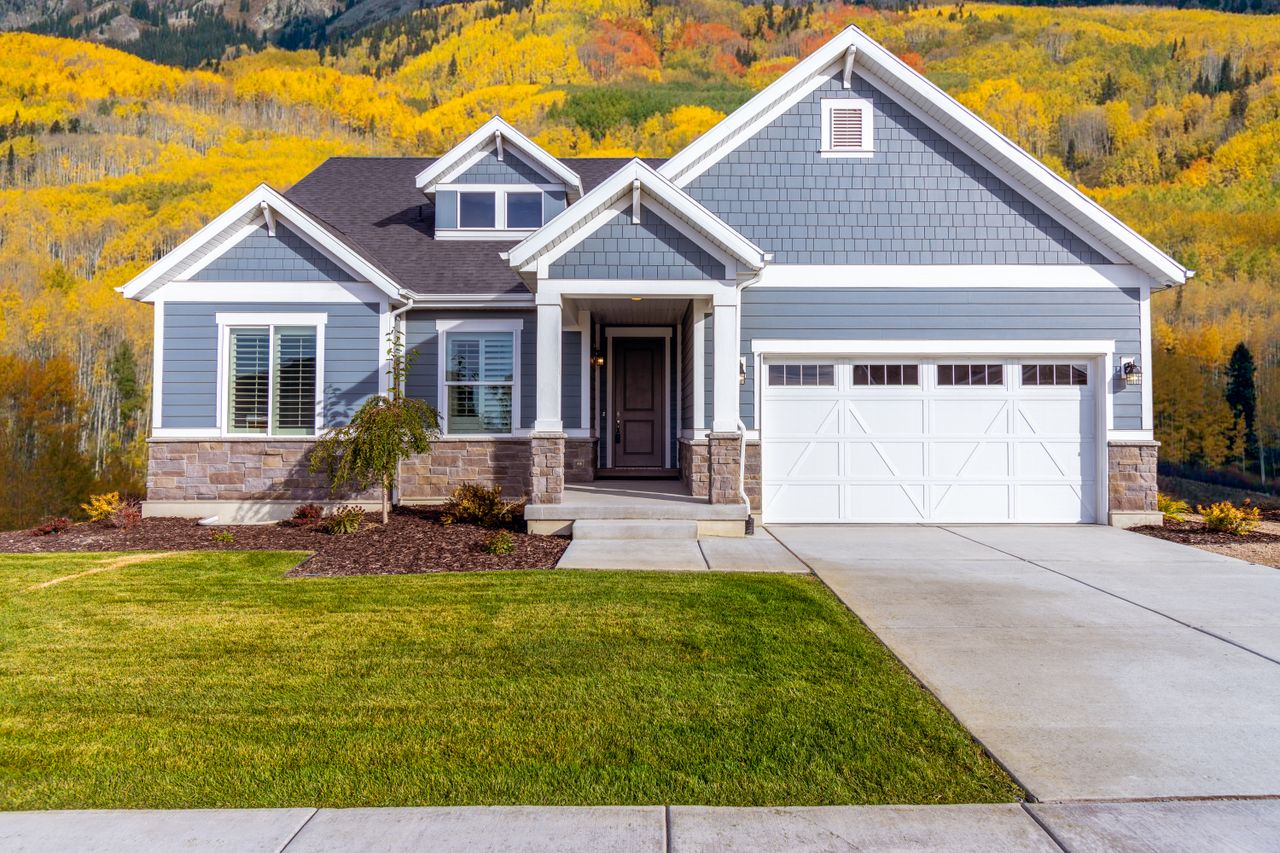 A single-family home with an attached garage on a residential street